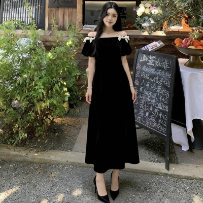 一字肩蝴蝶结丝绒长裙